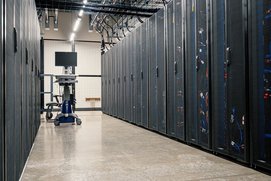 Data center racks — the availability substrate both SOC 2 and ISO 22301 evaluate from different angles.