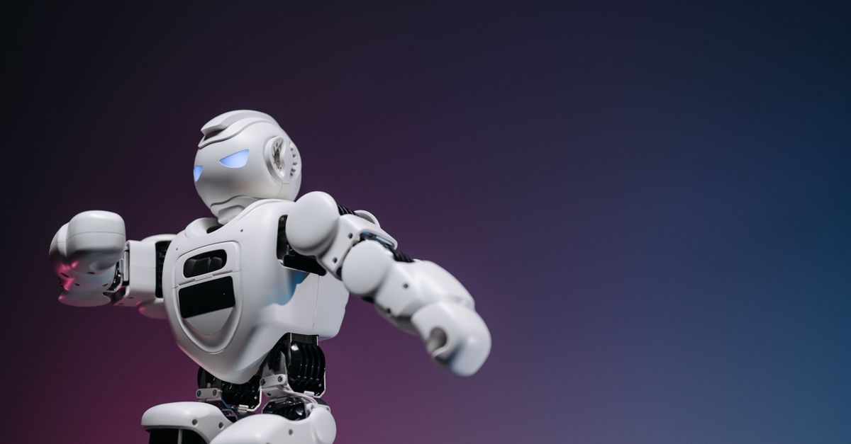 Engineer working with an AI interface — the governed AI systems an ISO 42001 management system is built to control.