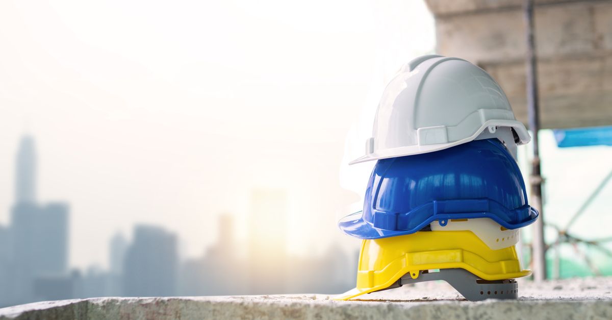 Construction worker in safety gear — the workplace safety ISO 45001 and OSHA both govern from different angles.