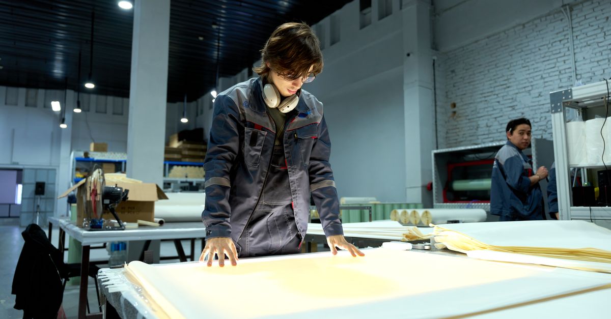 Quality inspection on a production line — the consistent output an ISO 9001 quality management system is built to deliver.